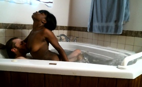 Busty Black Babe Fucked Hard By A White Guy In The Hot Tub