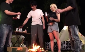 Buxom Oriental Bombshell Takes On A Gang Of Cocks Outdoors