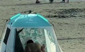 Beach voyeur films husband and wife having sex in a tent