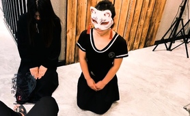 Masked Oriental slave spanked hard until her ass turns red 