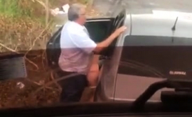 fat-old-man-gets-caught-on-cam-while-drilling-a-ho-outdoors